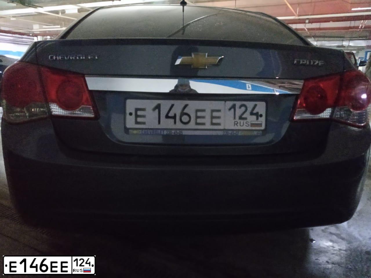 Фото автомобиля CHEVROLET CRUZE, 2011 — госномер Е146ЕЕ124. Цвет: СЕРЫЙ МЕТАЛЛИК