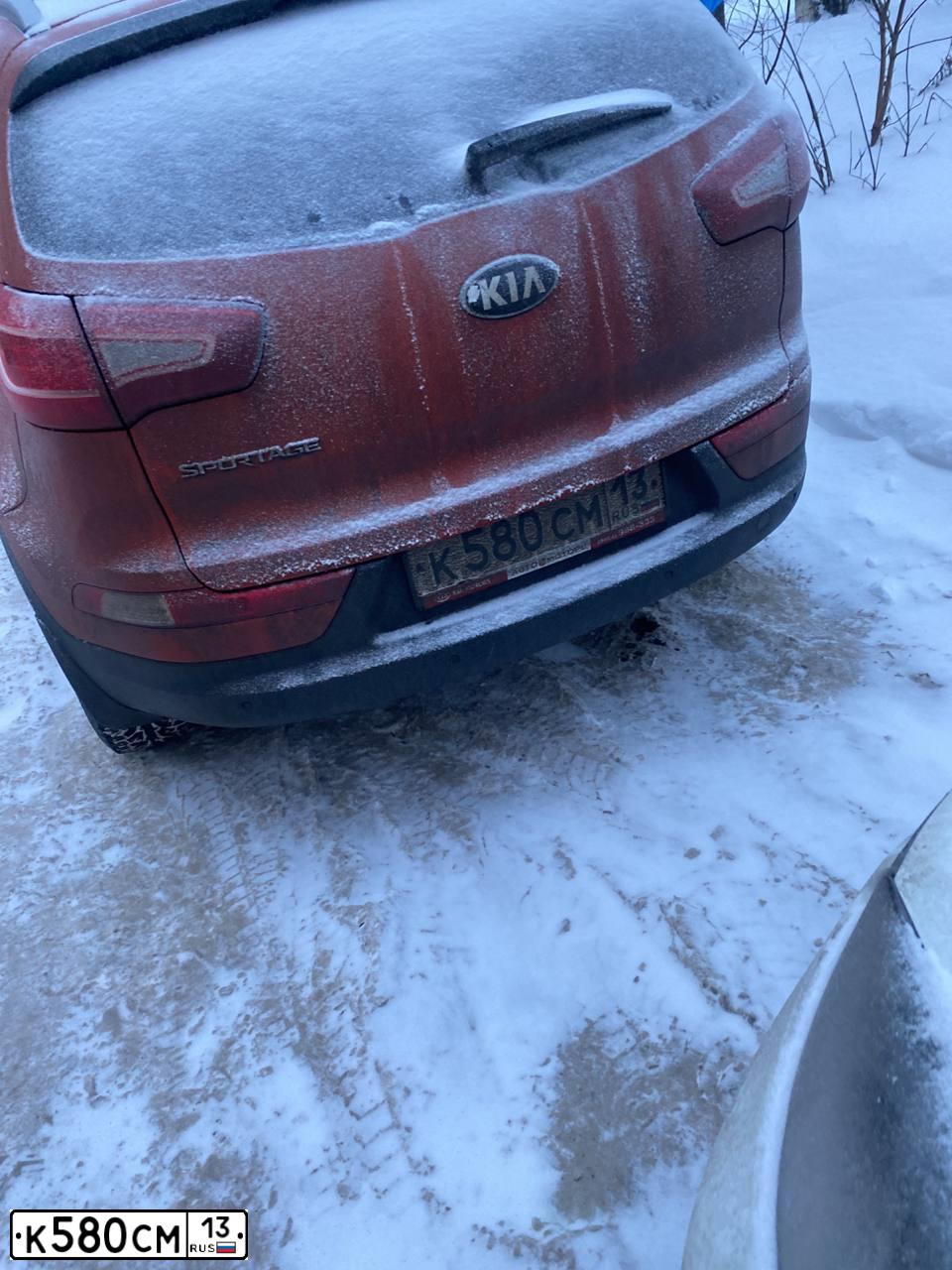 Фото автомобиля KIA SPORTAGE, 2013 — госномер К580СМ13. Цвет: ОРАНЖЕВЫЙ