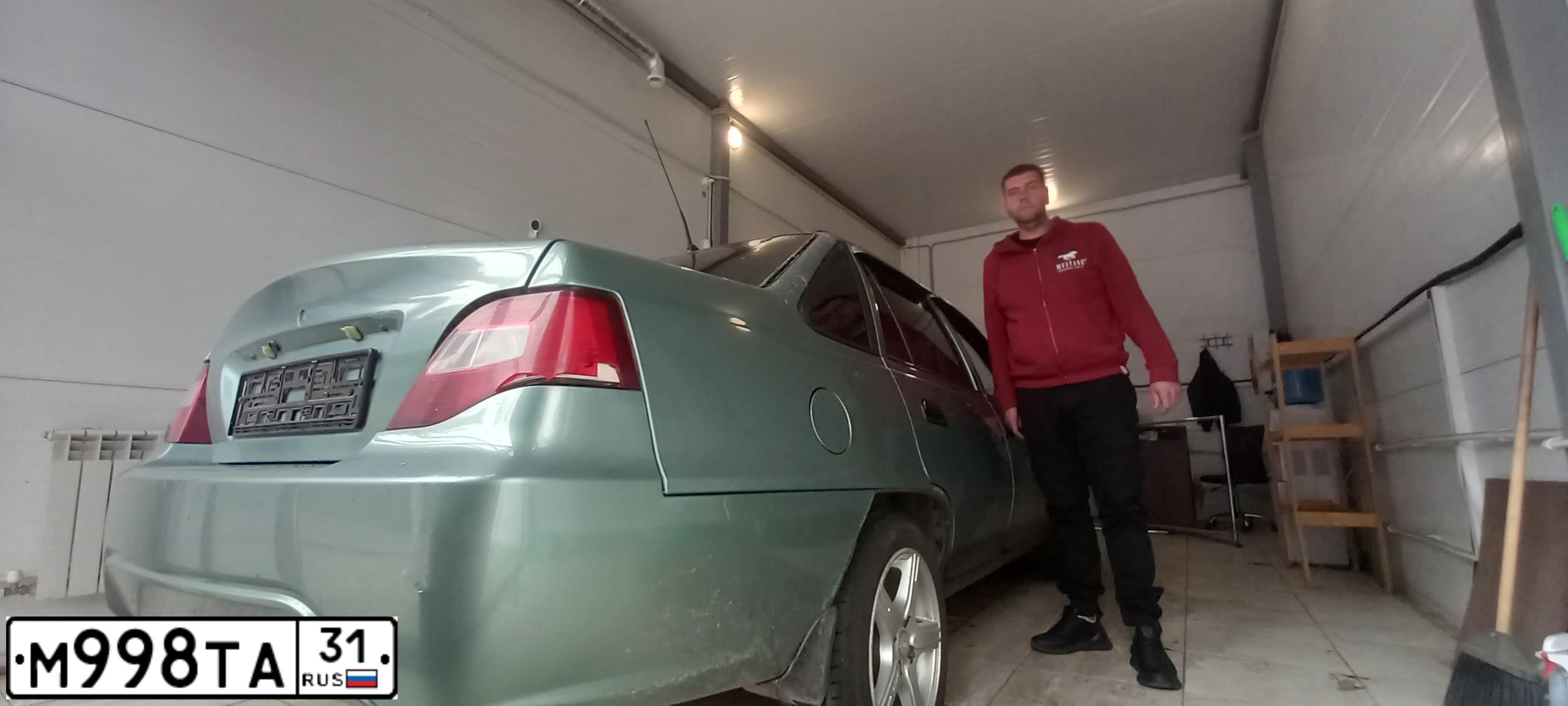 Фото автомобиля DAEWOO NEXIA, 2009 — госномер Т610МР136. Цвет: ЗЕЛЕНАЯ ГЛАЗУРЬ