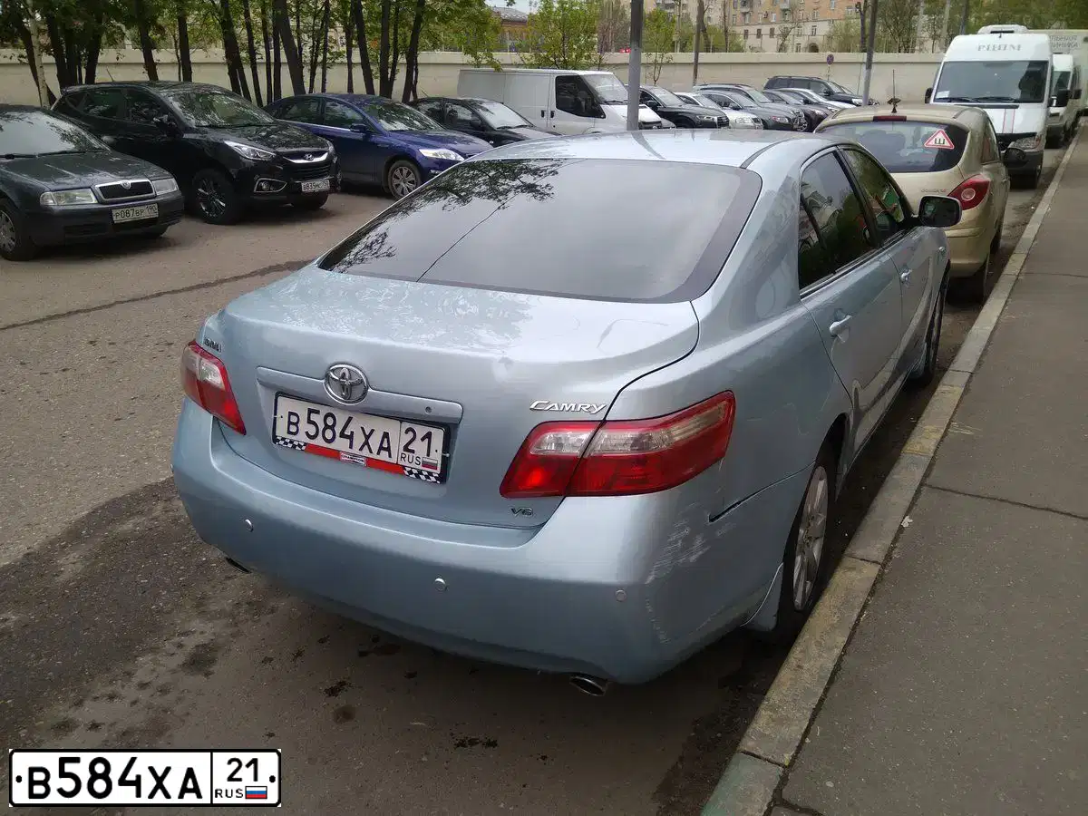 Фото автомобиля RENAULT LOGAN, 2008 — госномер В589ХА21. Цвет: ТЕМНО-СЕРЫЙ