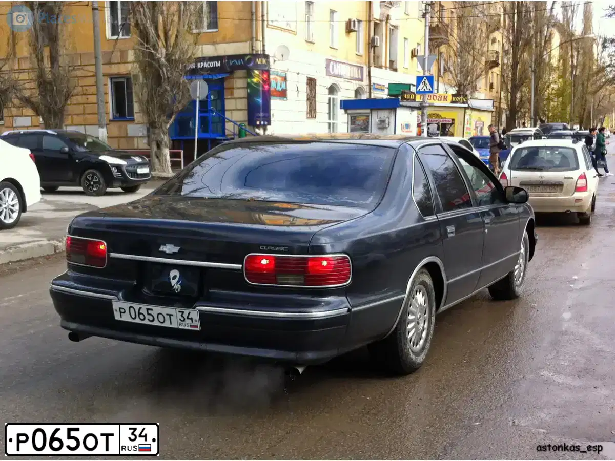 Фото автомобиля CHEVROLET ШЕВРОЛЕ КАПРИЗ, 1995 — госномер Р065ОТ34. Цвет: ЧЕРНЫЙ