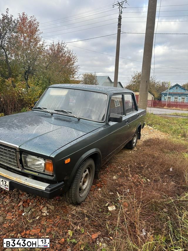 Фото автомобиля LADA 2107, 2010 — госномер Х980ТМ05. Цвет: Серо-сине-зеленый
