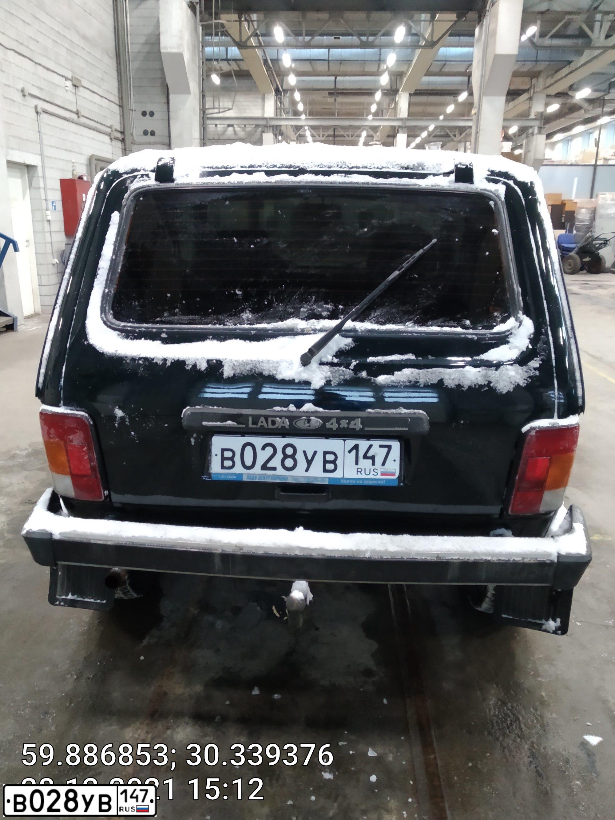Фото автомобиля LADA 2121 NIVA, 2014 — госномер В028УВ147. Цвет: Темно-зеленый