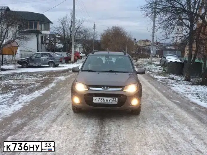 Фото автомобиля LADA 2194 KALINA, 2014 — госномер К736НУ33. Цвет: Золотисто-коричневый