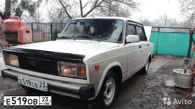 Фото автомобиля LADA 2105, 1990 — госномер Х158УС161. Цвет: БЕЛЫЙ