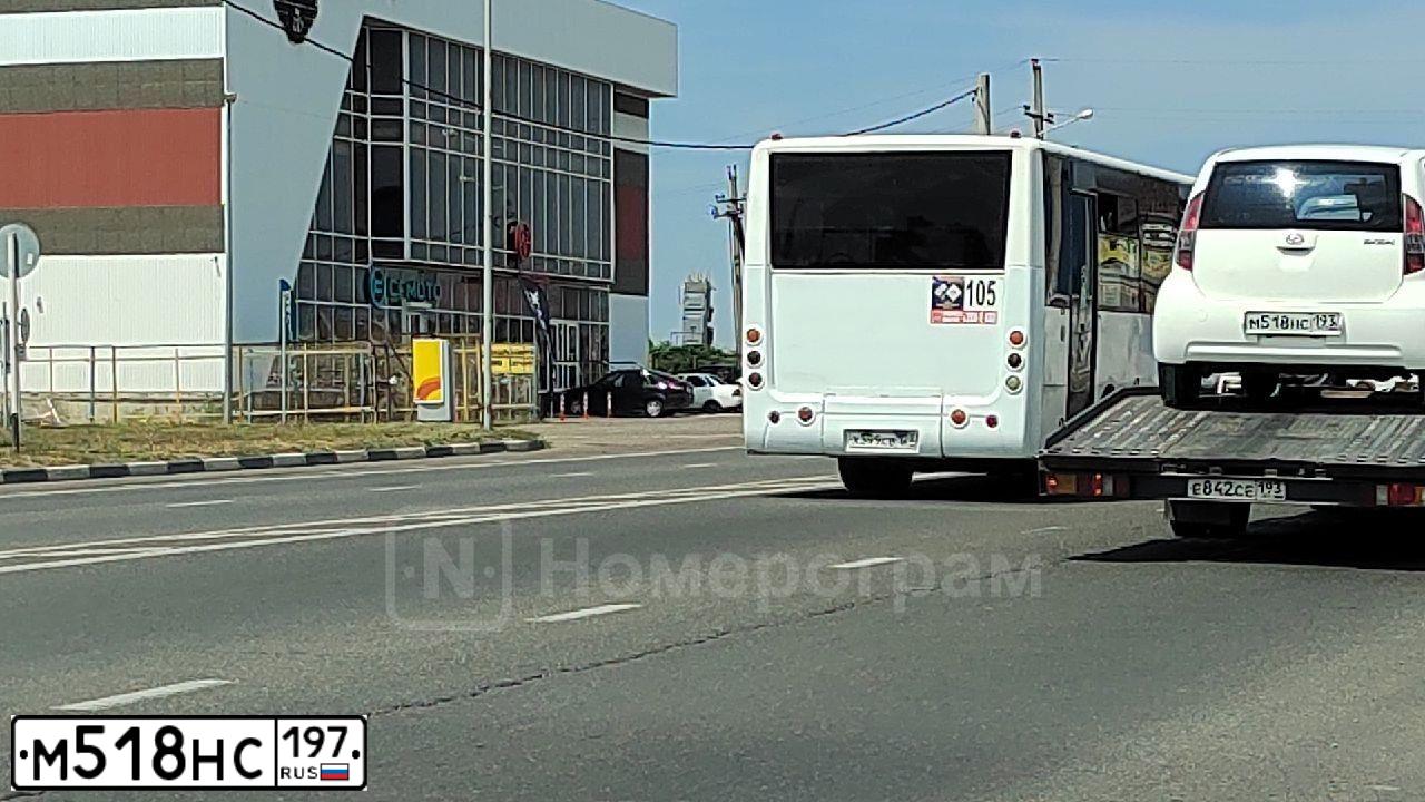 Фото автомобиля MITSUBISHI LANCER, 2008 — госномер М518НС197. Цвет: Красный
