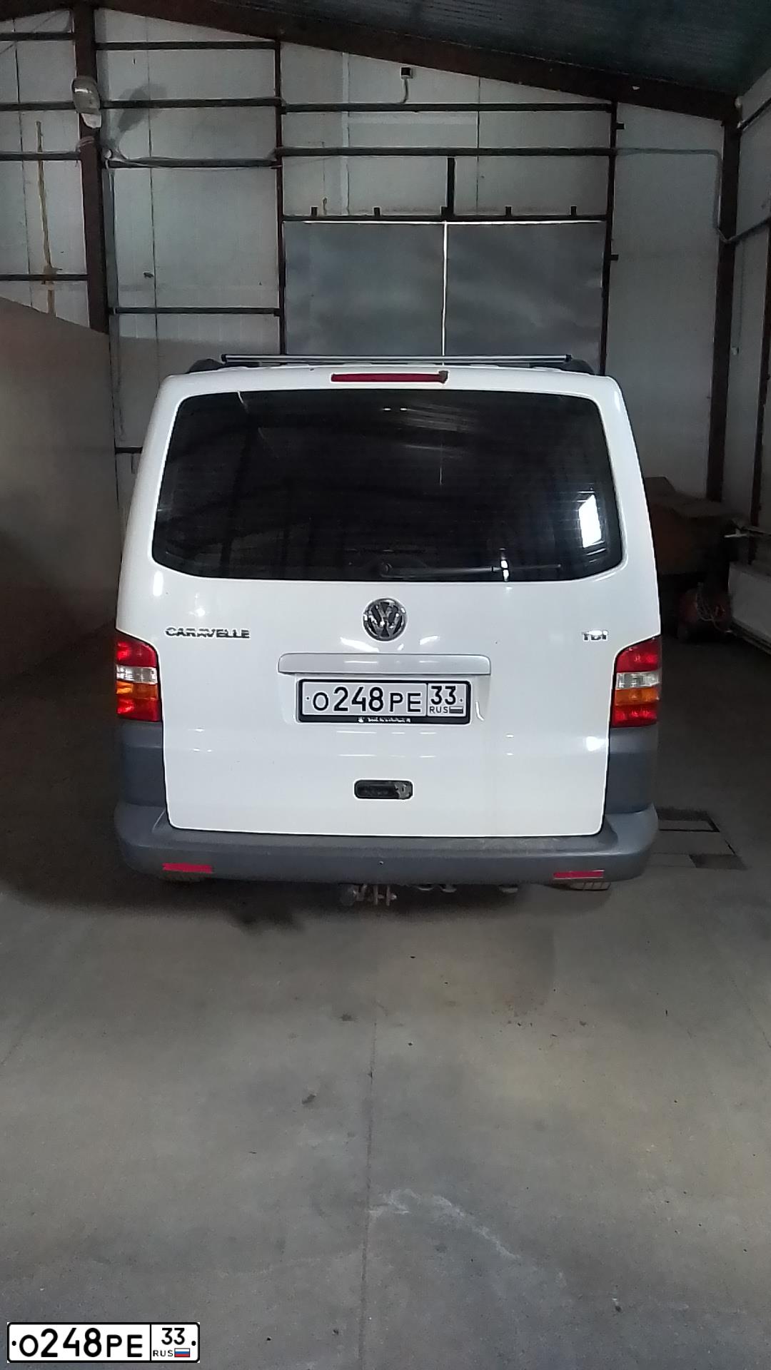 Фото автомобиля VOLKSWAGEN TRANSPORTER, 2009 — госномер О248РЕ33. Цвет: БЕЛЫЙ