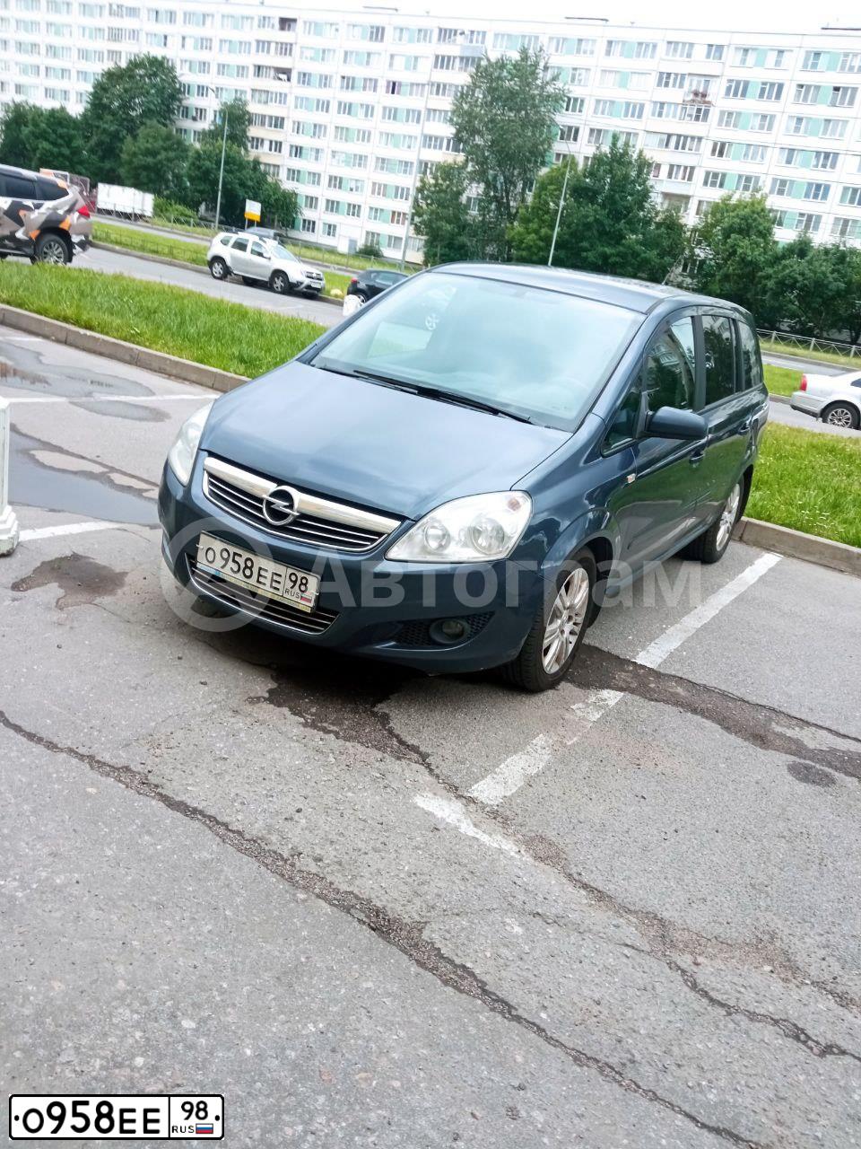 Фото автомобиля OPEL ZAFIRA, 2009 — госномер О958ЕЕ98. Цвет: СЕРО-СИНИЙ