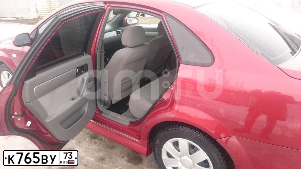 Фото автомобиля CHEVROLET LACETTI, 2008 — госномер К765ВУ73. Цвет: Красный