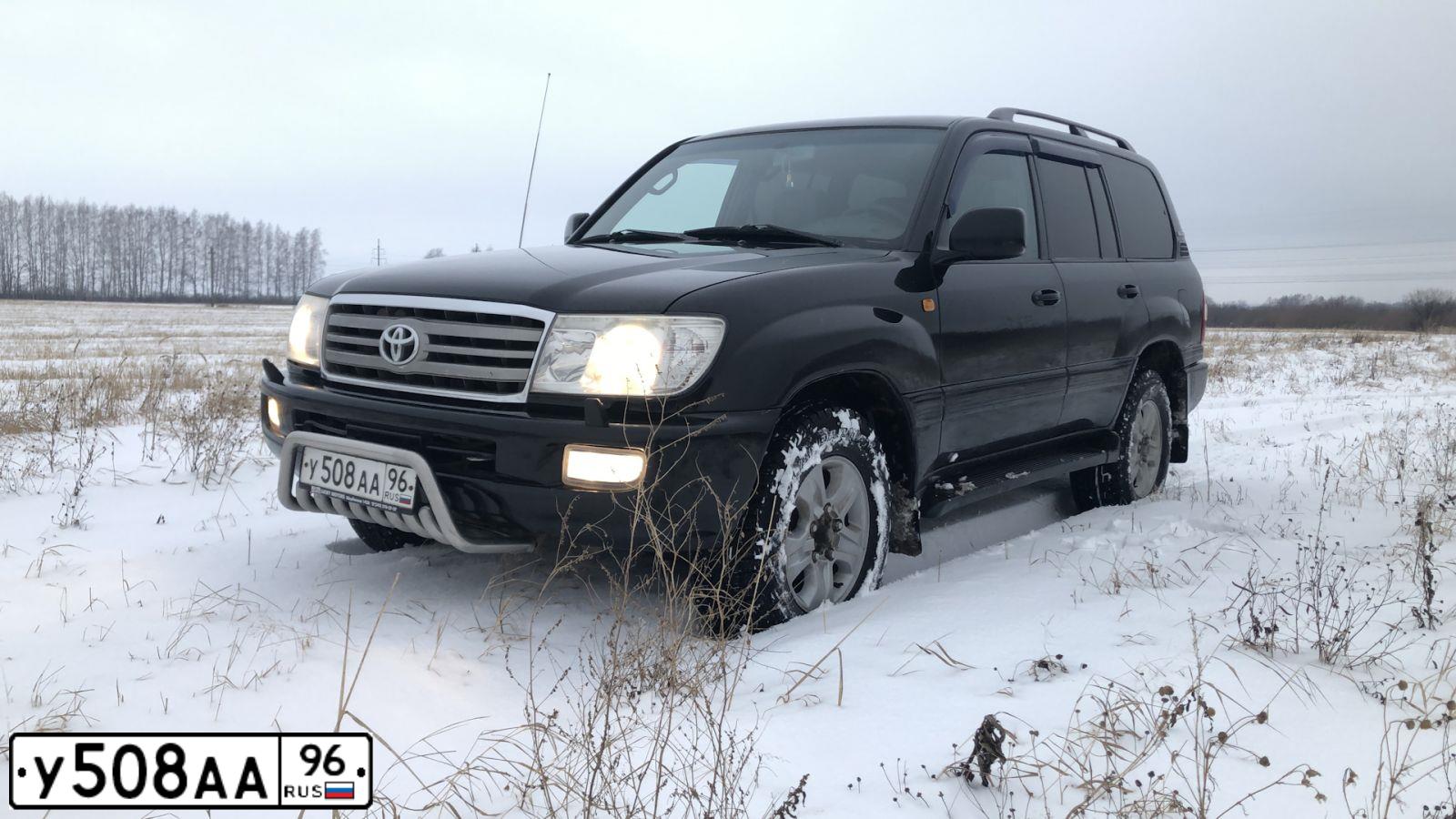 Фото автомобиля TOYOTA LANDCRUISER, 2006 — госномер Н335АА702. Цвет: ЧЕРНЫЙ