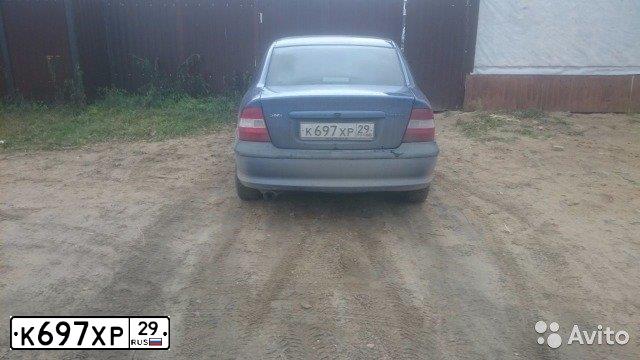 Фото автомобиля OPEL VECTRA, 1997 — госномер К697ХР29. Цвет: СИНИЙ