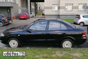 Фото автомобиля NISSAN ALMERA, 2010 — госномер К240МТ21. Цвет: ЧЕРНЫЙ