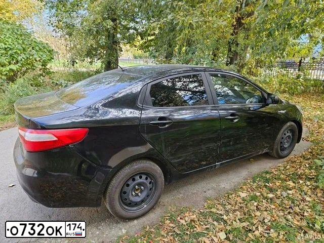 Фото автомобиля KIA RIO, 2011 — госномер Т491ВН196. Цвет: ЧЕРНЫЙ