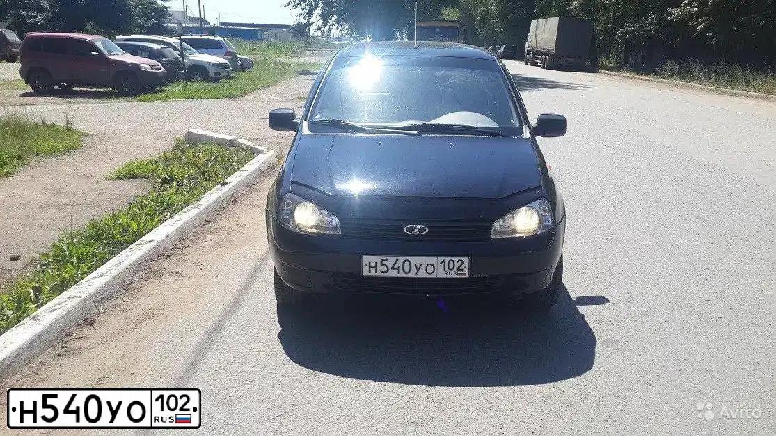 Фото автомобиля LADA 1119 KALINA, 2012 — госномер Н540УО102. Цвет: Сине-Черный