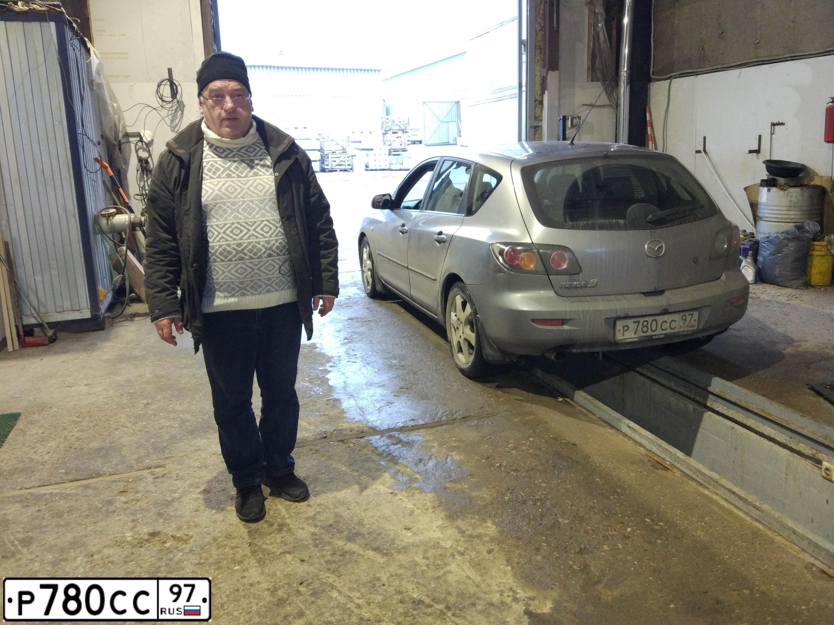 Фото автомобиля MAZDA 3, 2005 — госномер Х991ОХ797. Цвет: ТЕМНО-СЕРЫЙ