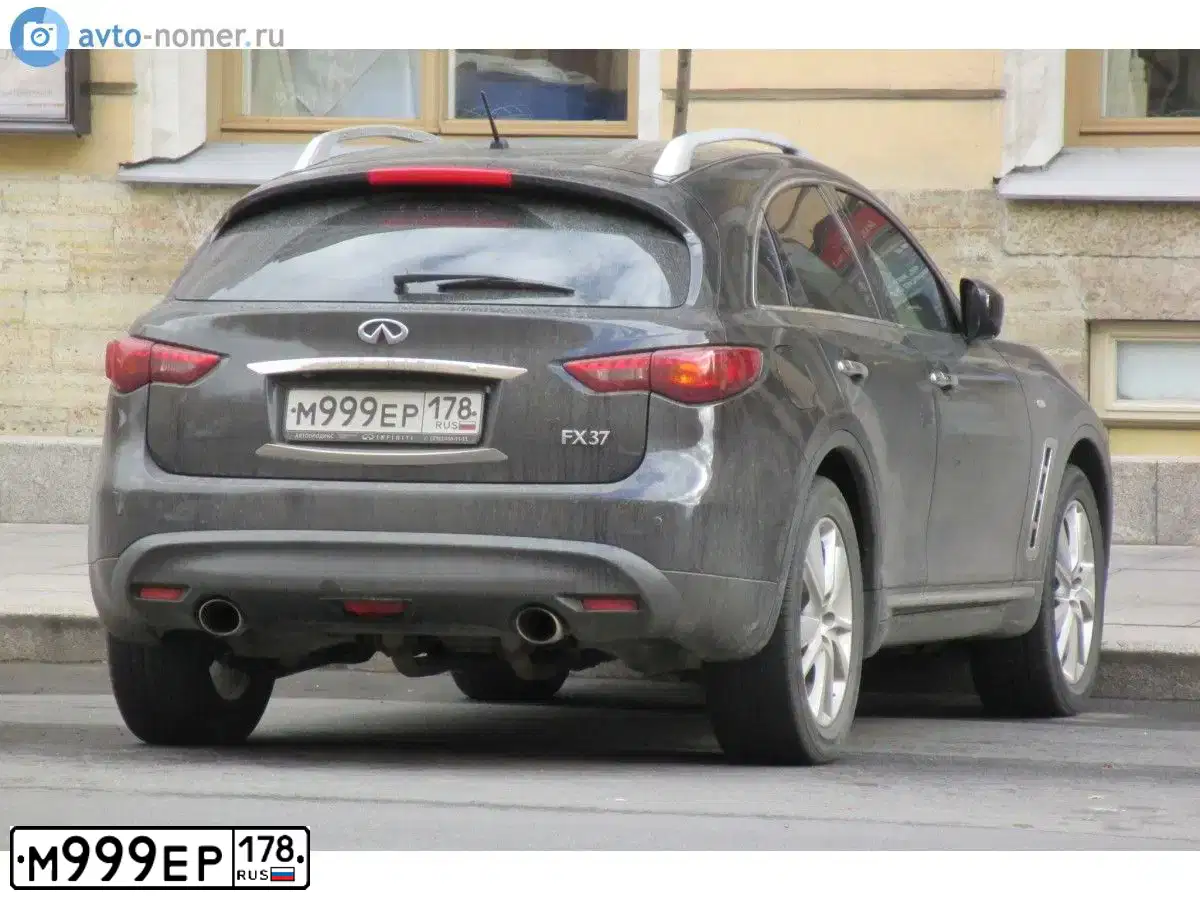Фото автомобиля INFINITI QX70 /FX/, 2011 — госномер Е565ЕЕ98. Цвет: ЧЕРНЫЙ