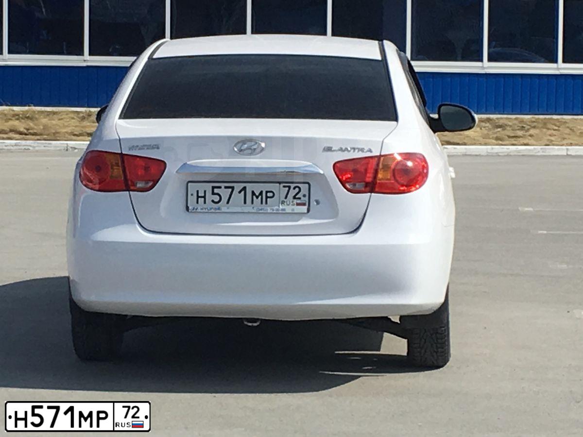 Фото автомобиля HYUNDAI ELANTRA, 2010 — госномер У093ОР72. Цвет: Белый