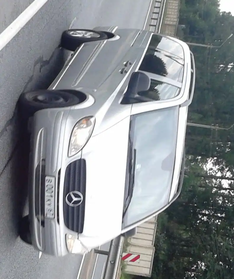 Фото автомобиля LADA 2112, 2005 — госномер В001КУ67. Цвет: ЧЕРНЫЙ