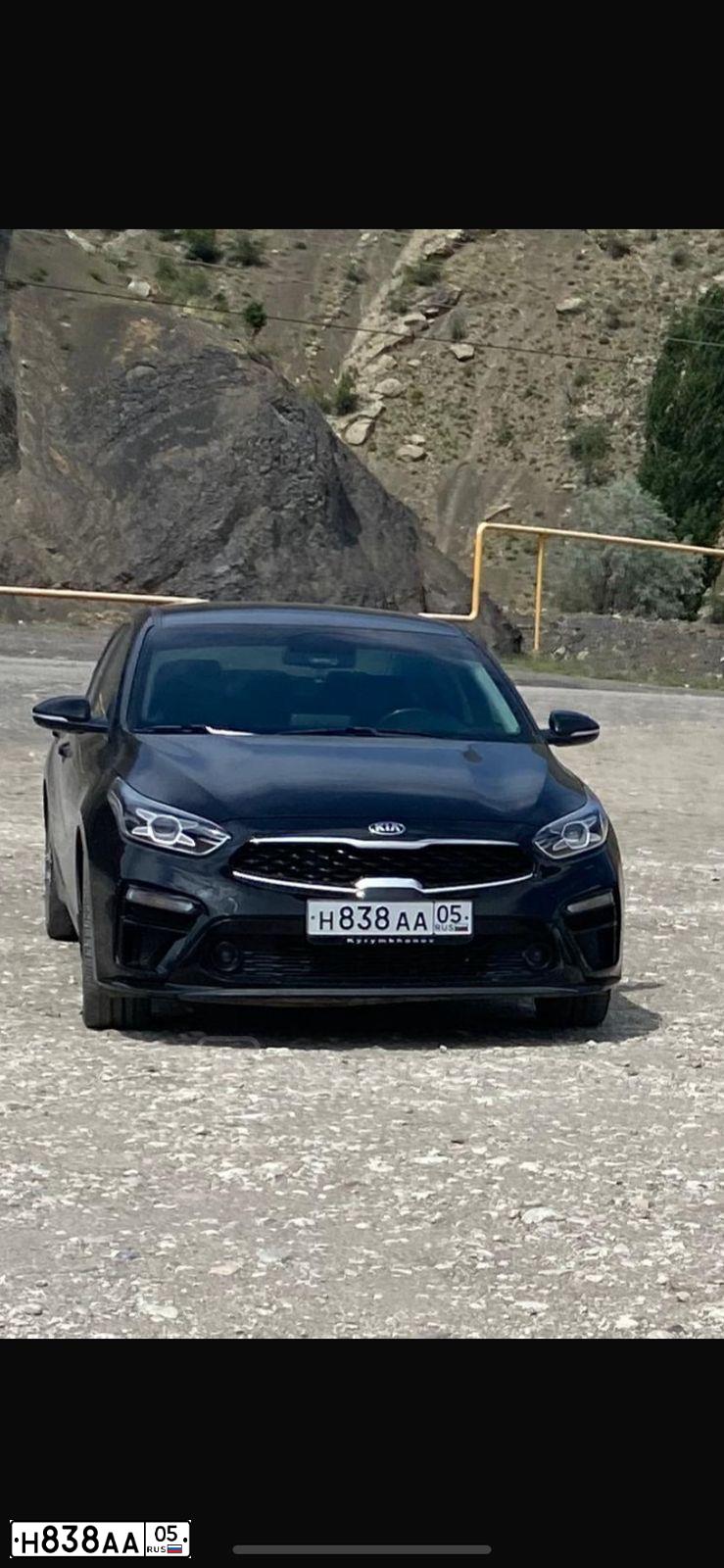 Фото автомобиля KIA CERATO, 2018 — госномер Н838АА05. Цвет: ЧЕРНЫЙ
