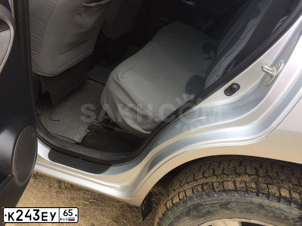 Фото автомобиля TOYOTA RAV4, 2007 — госномер К243ЕУ65. Цвет: Серебристый