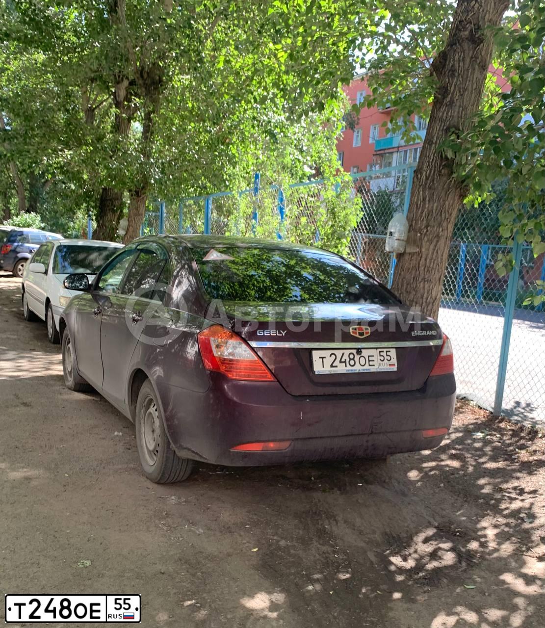 Фото автомобиля GEELY EMGRAND, 2014 — госномер Т248ОЕ55. Цвет: ТЕМНО-КРАСНЫЙ