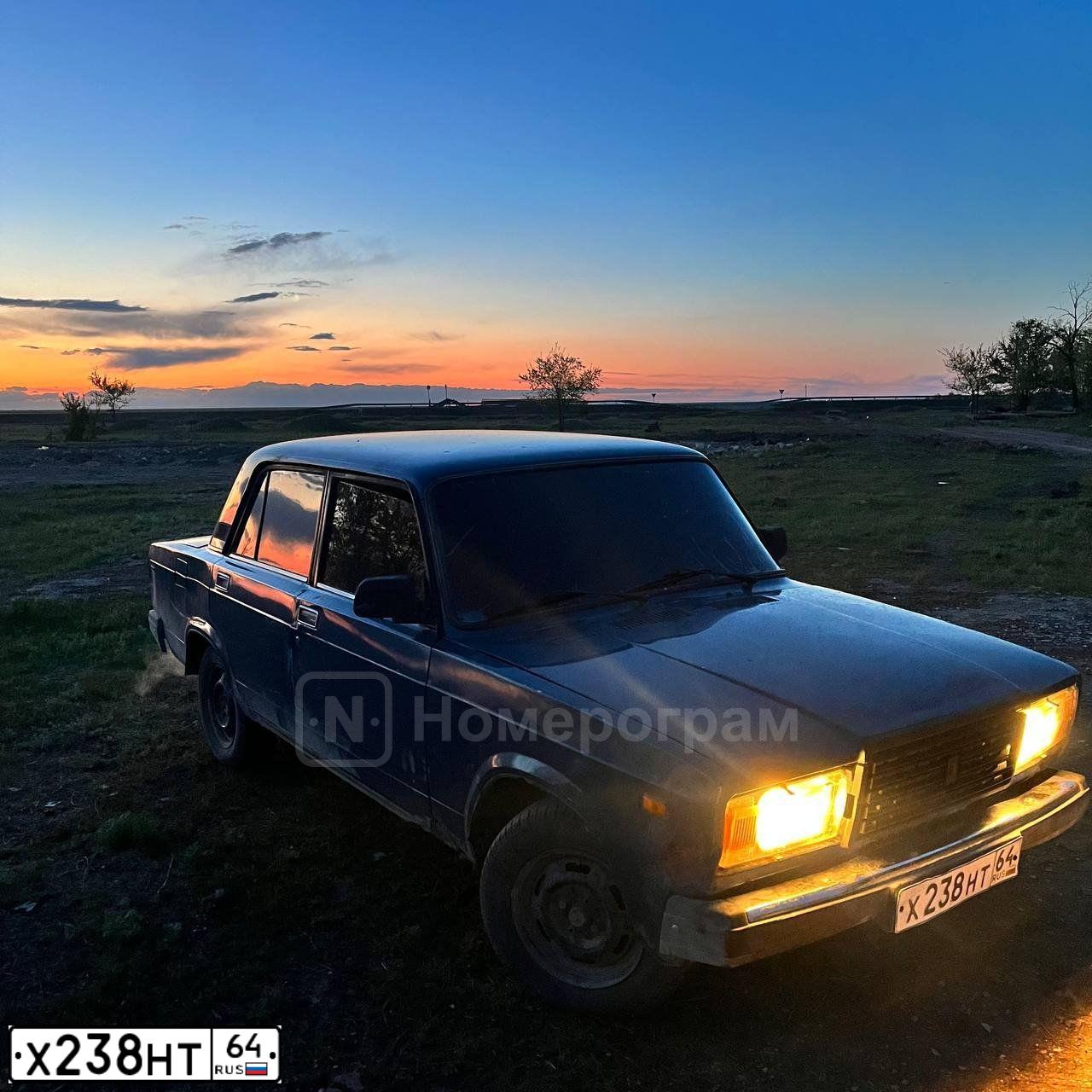 Фото автомобиля LADA 2107, 2003 — госномер Х238НТ64. Цвет: СИНЕ ЗЕЛЕНЫЙ