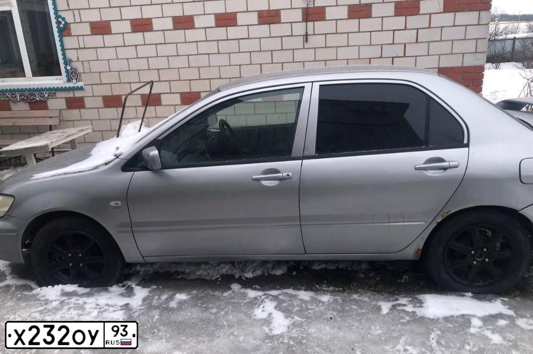 Фото автомобиля MITSUBISHI LANCER, 2002 — госномер Х803ВВ193. Цвет: СЕРЕБРИСТЫЙ