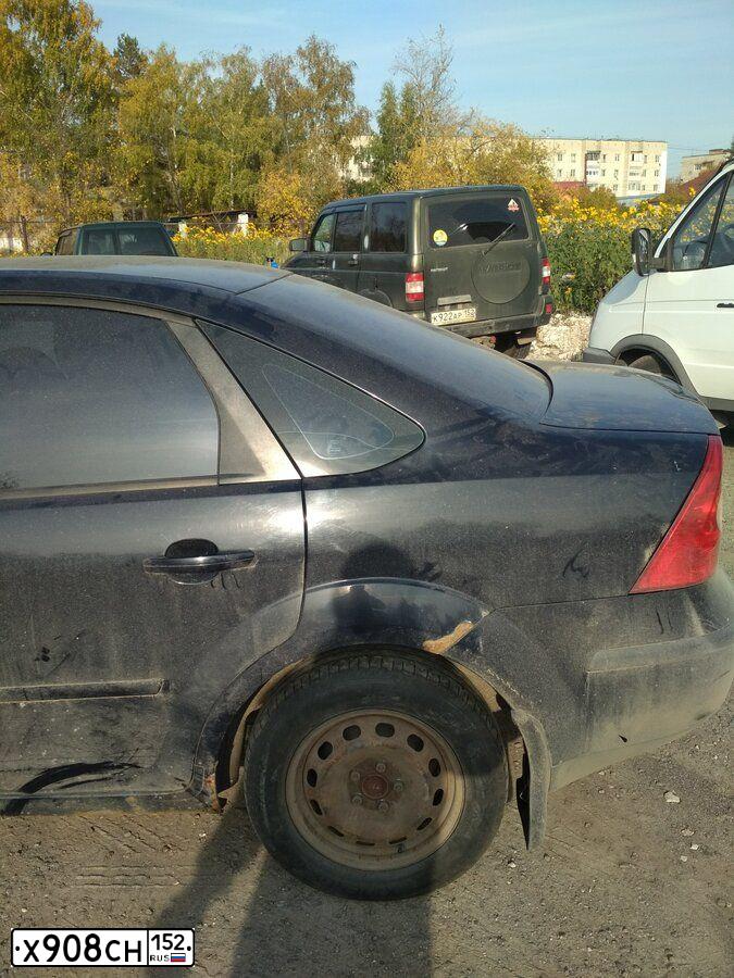 Фото автомобиля FORD FOCUS, 2005 — госномер Х908СН152. Цвет: Темно-синий