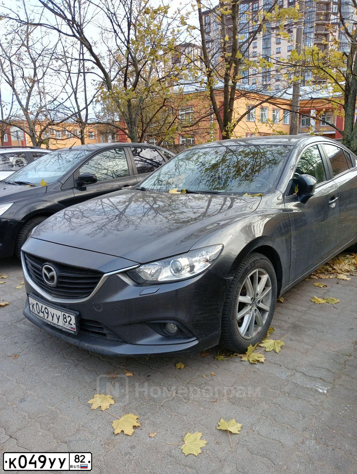Фото автомобиля MAZDA 6, 2016 — госномер К049УУ82. Цвет: ТЕМНО-СЕРЫЙ