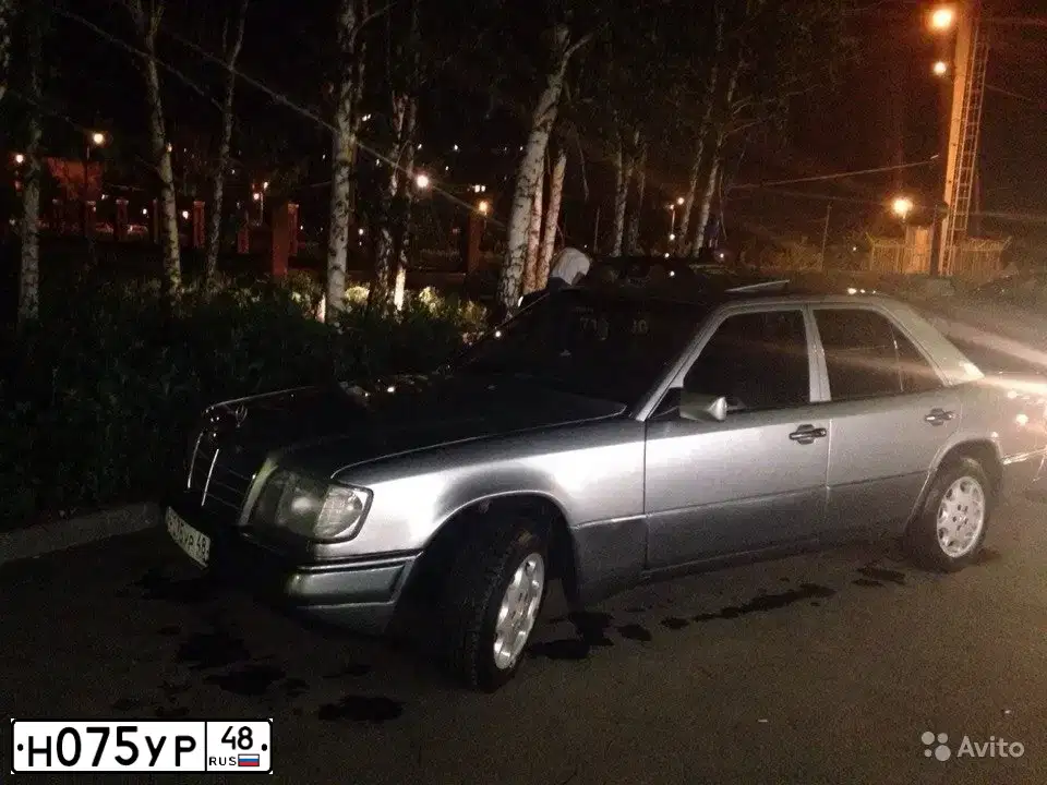 Фото автомобиля MERCEDES E-KLASSE, 1989 — госномер Н075УР48. Цвет: Серый