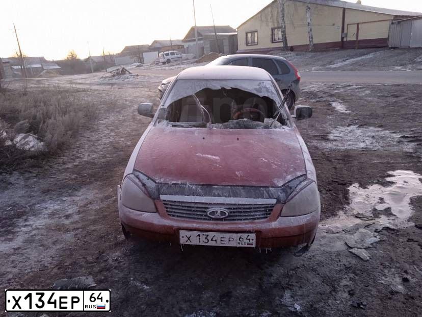 Фото автомобиля LADA 2172 PRIORA, 2010 — госномер Х134ЕР64. Цвет: ЗОЛОТИСТО-КРАСНЫЙ