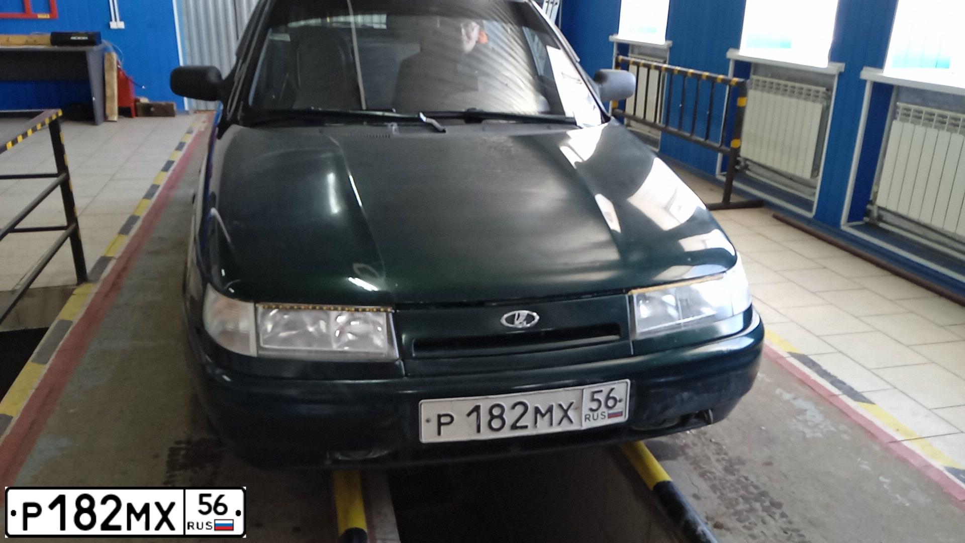 Фото автомобиля LADA 2112, 2004 — госномер Р182МХ56. Цвет: ТЕМНО-ЗЕЛЕНЫЙ