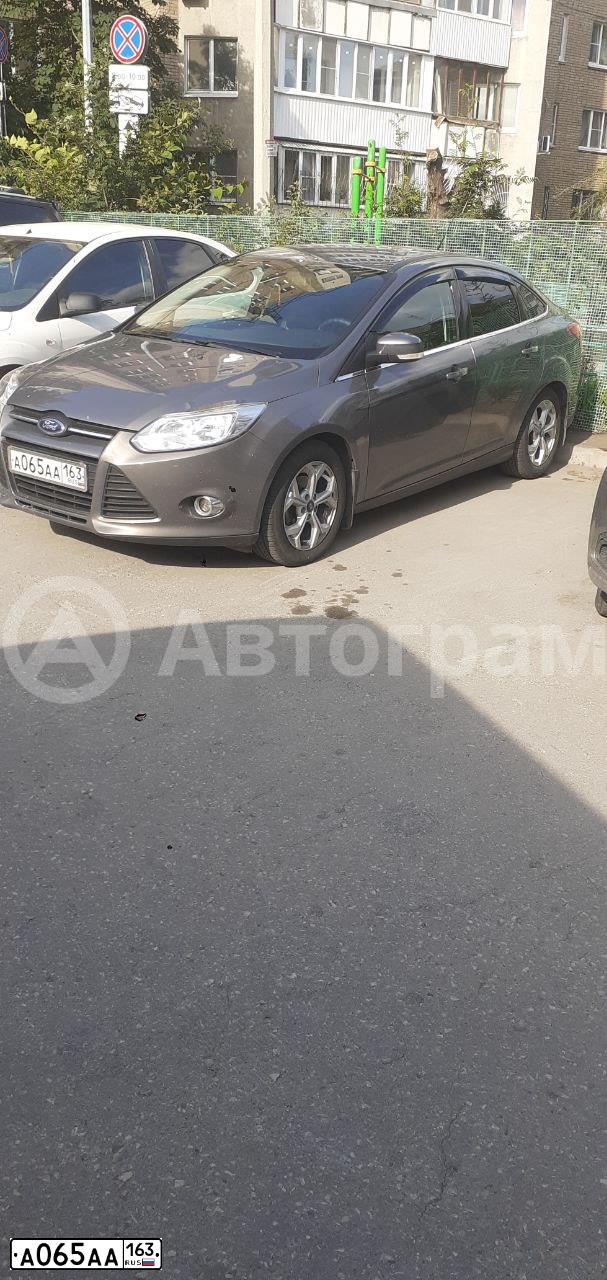 Фото автомобиля FORD FOCUS, 2012 — госномер А065АА163. Цвет: СЕРО-КОРИЧНЕВЫЙ