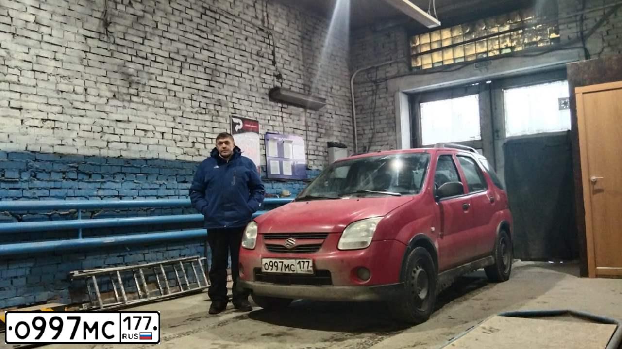 Фото автомобиля SUZUKI IGNIS, 2006 — госномер О397РА154. Цвет: Красный