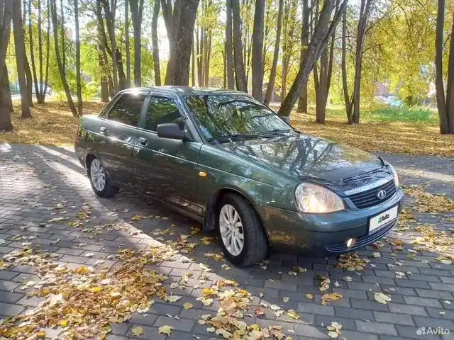 Фото автомобиля LADA PRIORA, 2010 — госномер В570СМ37. Цвет: Серо-сине-зеленый