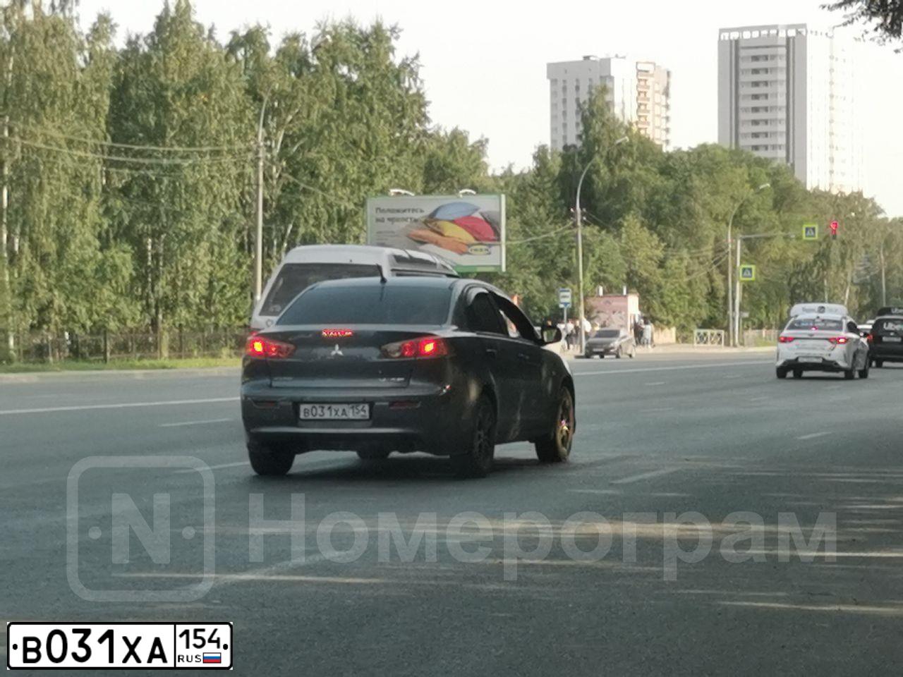 Фото автомобиля MITSUBISHI LANCER, 2008 — госномер У879МУ142. Цвет: СЕРЫЙ