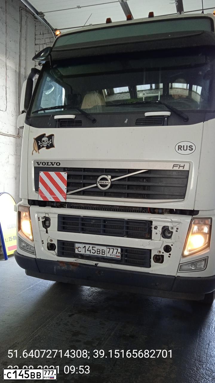 Фото автомобиля VOLVO SERIE FH /6X4/, 2014 — госномер С145ВВ777. Цвет: Белый
