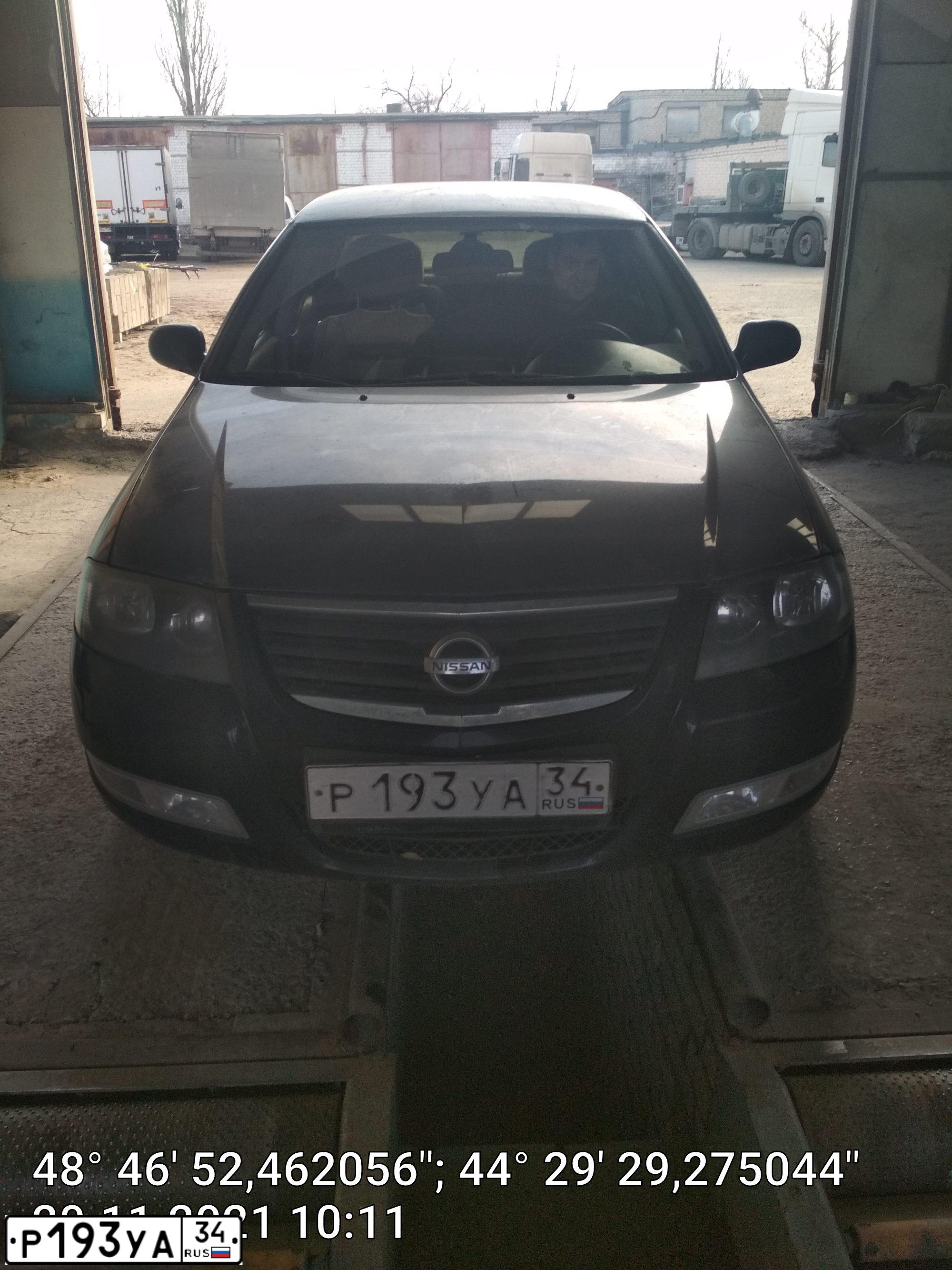 Фото автомобиля NISSAN ALMERA, 2010 — госномер Р193УА34. Цвет: ЧЕРНЫЙ