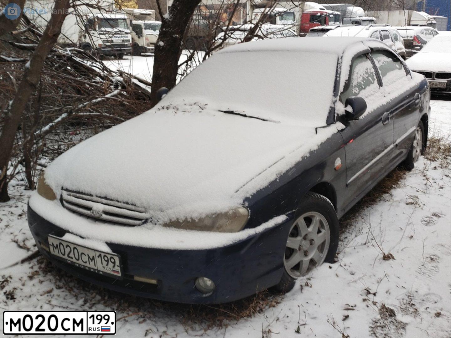 Фото автомобиля KIA SPECTRA, 2009 — госномер М020СМ199. Цвет: СИНИЙ