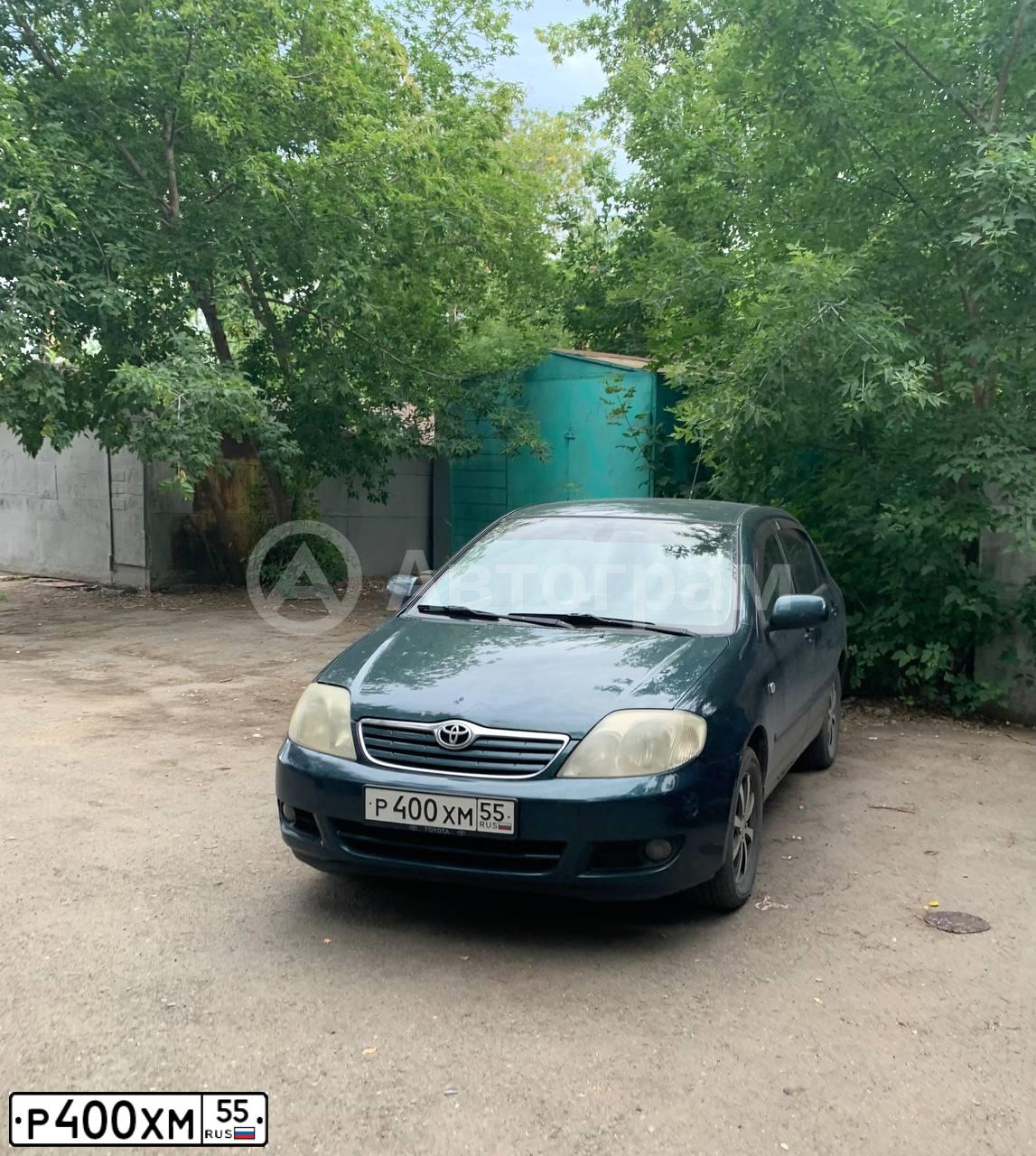 Фото автомобиля TOYOTA COROLLA, 2006 — госномер О482ТО55. Цвет: ТЕМНО-ЗЕЛЕНЫЙ