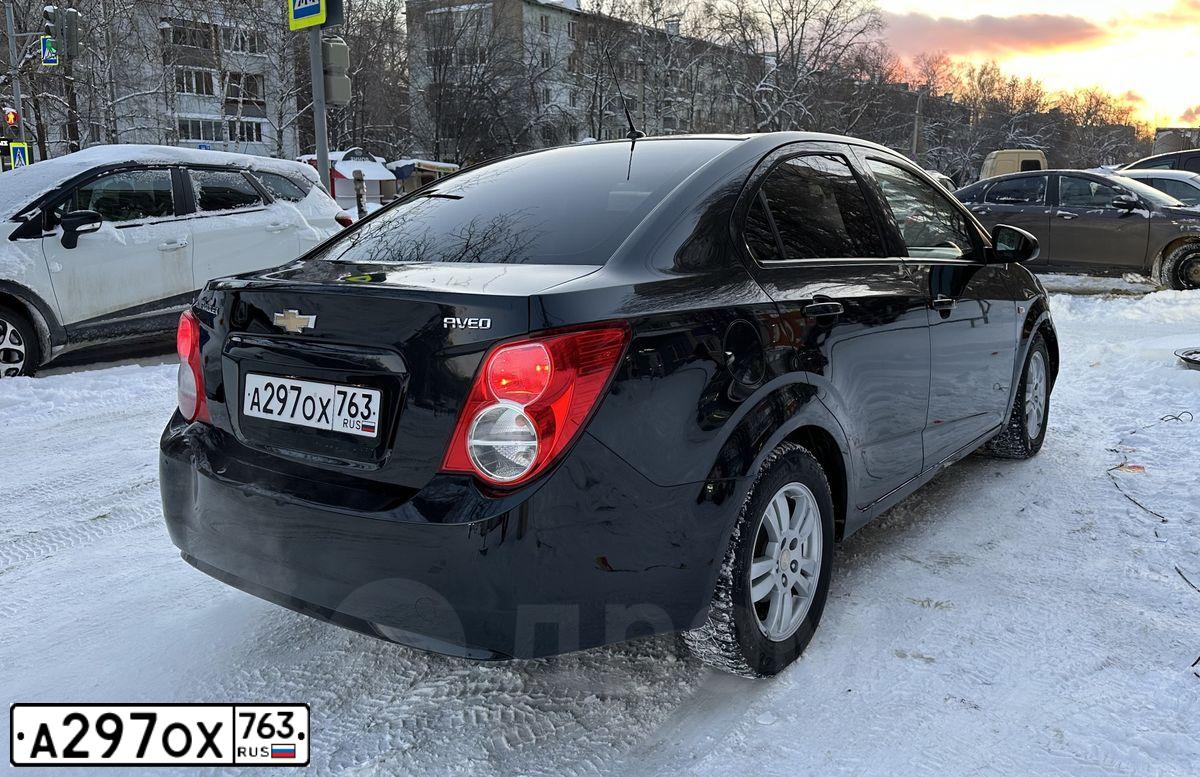 Фото автомобиля CHEVROLET AVEO, 2014 — госномер М416РЕ763. Цвет: ЧЕРНЫЙ МЕТАЛЛИК