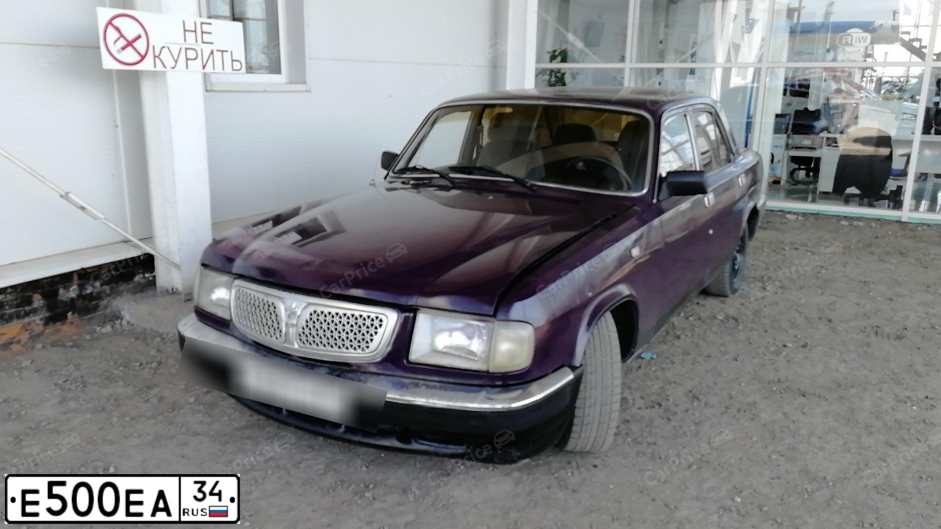 Фото автомобиля GAZ 3110 WOLGA, 2000 — госномер Е500ЕА34. Цвет: БАКЛАЖАННЫЙ