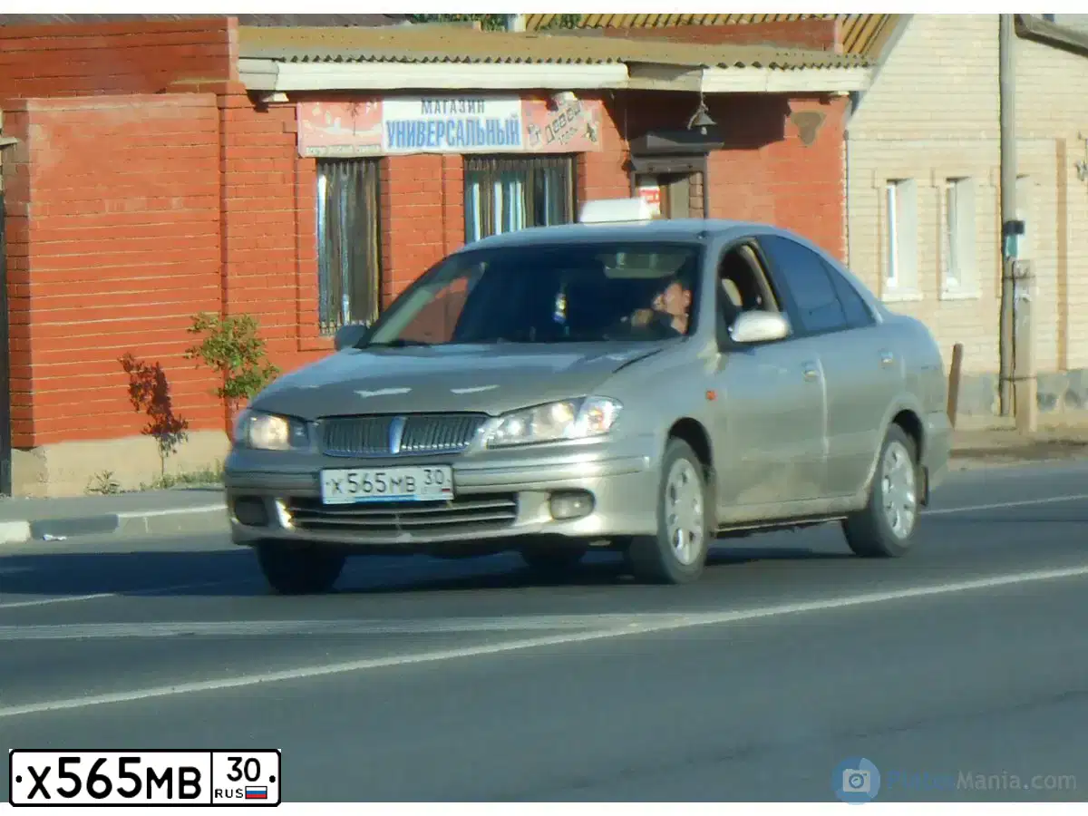 Фото автомобиля NISSAN SUNNY, 2001 — госномер Х565МВ30. Цвет: БЕЖЕВЫЙ