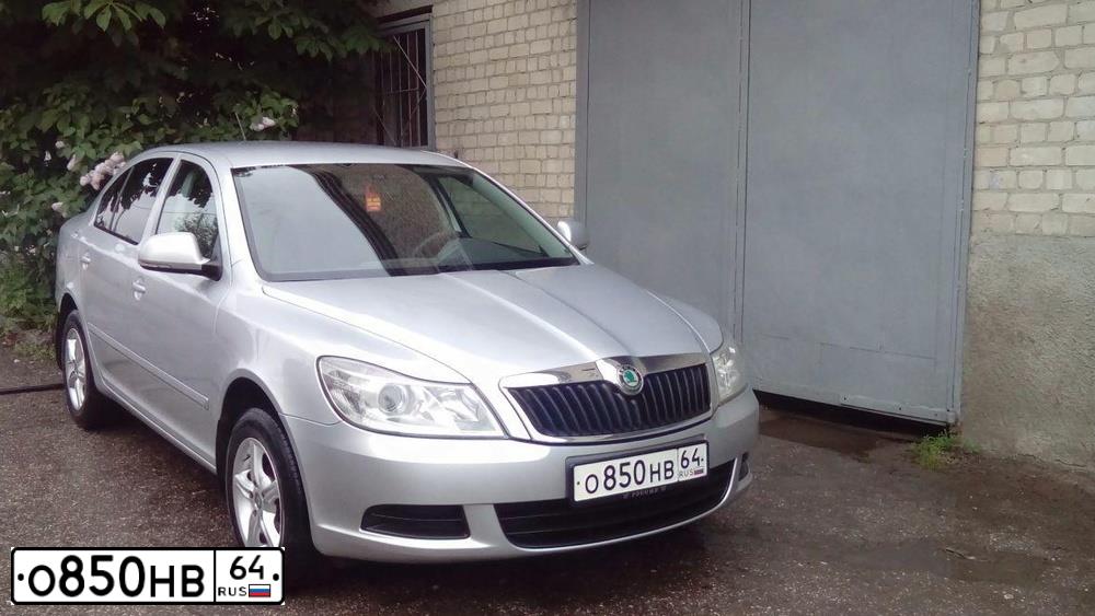 Фото автомобиля LADA 2110 LADA, 2005 — госномер М303СУ64. Цвет: ТЕМНО ЗЕЛЕНЫЙ