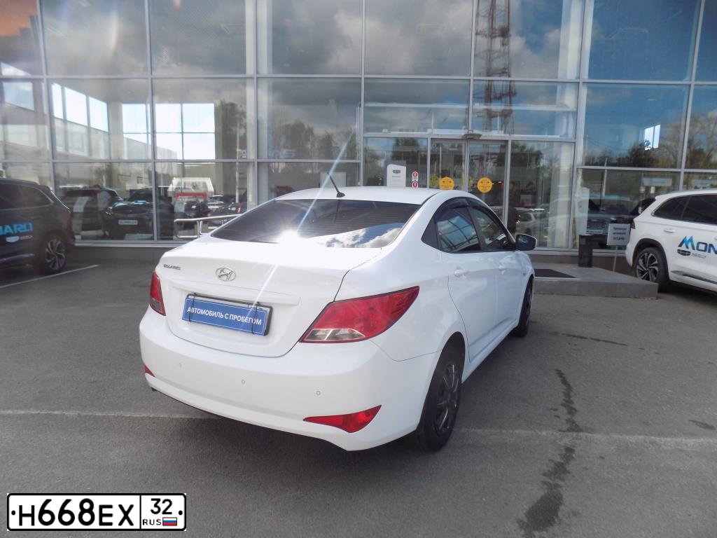 Фото автомобиля HYUNDAI SOLARIS, 2016 — госномер Н668ЕХ32. Цвет: БЕЛЫЙ