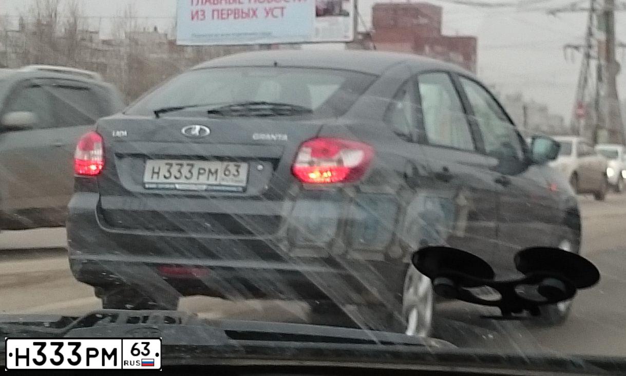 Фото автомобиля LADA 2191 GRANTA, 2015 — госномер Н333РМ63. Цвет: СЕРЕБРИСТО-ТЕМНО-СЕРЫЙ