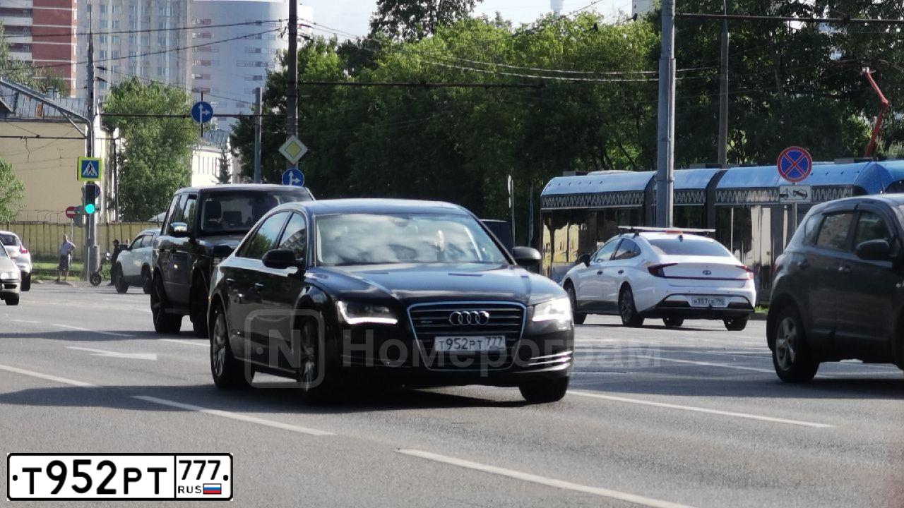Фото автомобиля AUDI A8, 2011 — госномер Т952РТ777. Цвет: ЧЕРНЫЙ