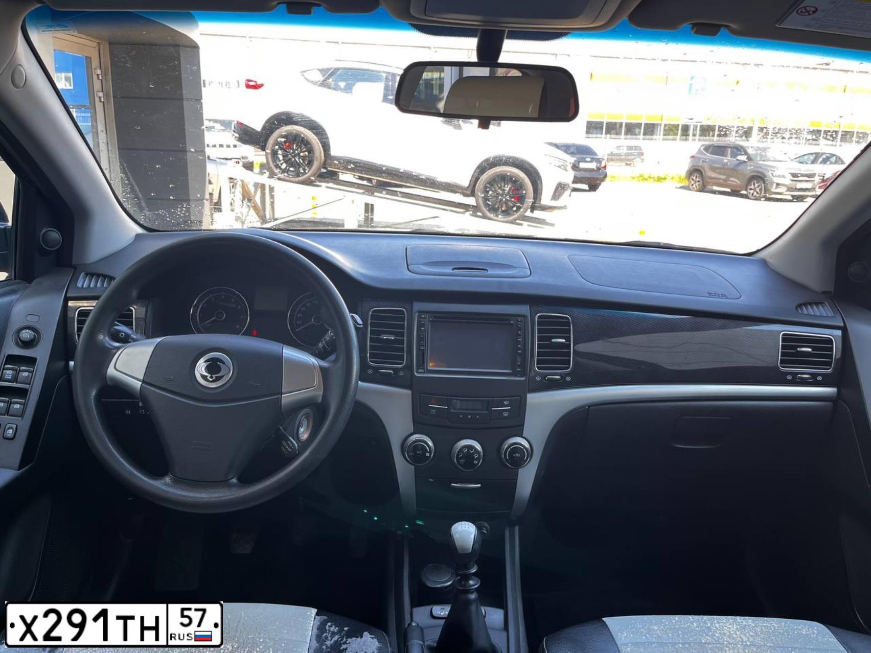 Фото автомобиля SSANGYONG ACTYON, 2013 — госномер Х291ТН57. Цвет: ЧЕРНЫЙ