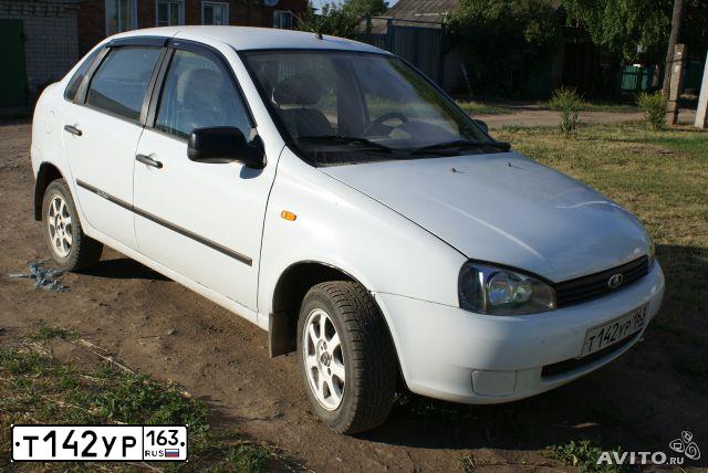 Фото автомобиля LADA 1118 KALINA, 2010 — госномер Т142УР163. Цвет: БЕЛЫЙ