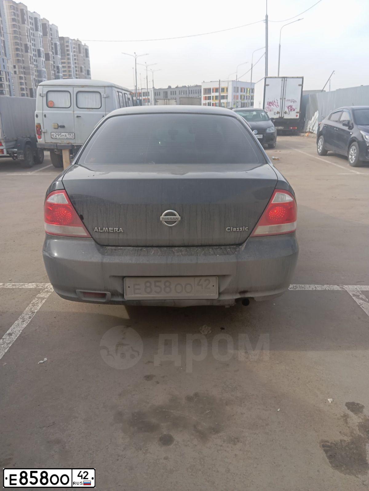 Фото автомобиля NISSAN ALMERA, 2011 — госномер Е858ОО42. Цвет: ЧЕРНЫЙ